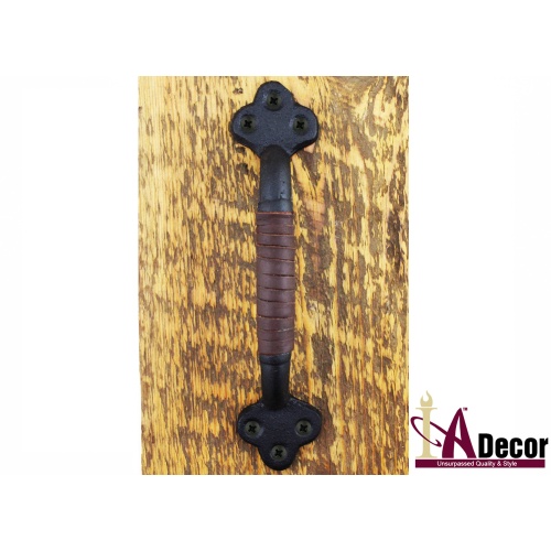 blackhandlewithbrownleatheronwood